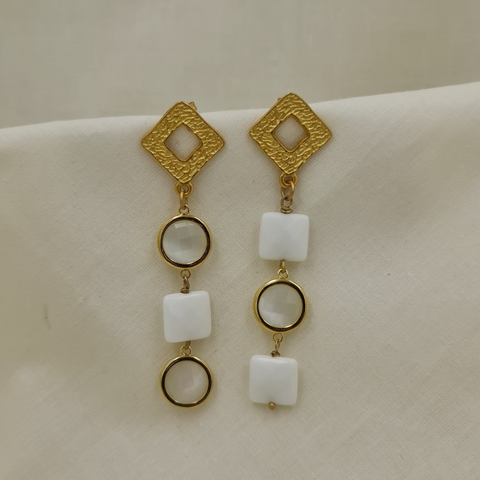 orecchini annagi milano linea uguali diversi